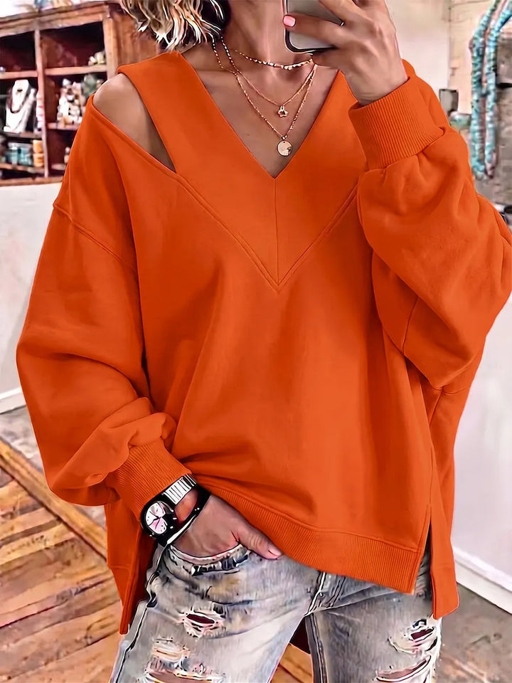 Kirstan - Sudadera Oversize Con Cuello en V y Aberturas Elegantes