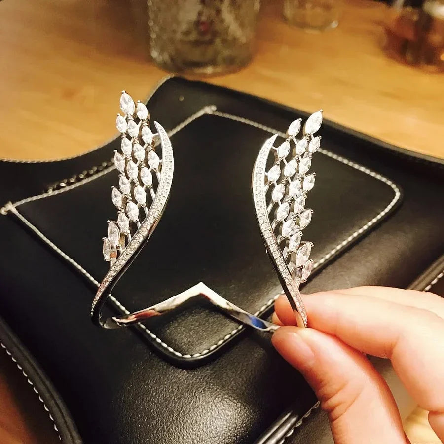 Evita - Pulsera y Anillo Alas de Ángel