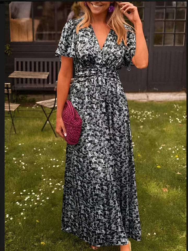Sampaio – Elegante Vestido Con Escote en V y Estampado Floral