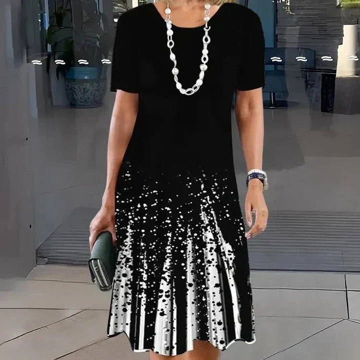 Lourah – Vestido Midi Plisado Estampado